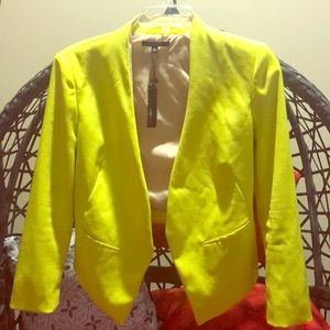 Yellow asymmetric cropped blazer
